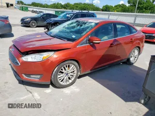 2018 Ford Focus Titanium z VIN 1FADP3J29JL294597, wystawiony jako Copart lot #61452335 z przebiegiem 108 207 mil mil oraz Szkoda całkowita • Salvage title. Historia ofert i sprzedaży dostępna na DreamBid. Obrazek 1.