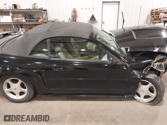 2001 Ford Mustang Deluxe with VIN 1FAFP44471F209492, listed as a IAAI auction lot 42049807 with 46,737 mi miles and . Bid and sale history available at DreamBid. Image 14.