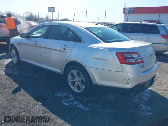 2013 Ford Taurus SEL with VIN 1FAHP2E8XDG164903, listed as a IAAI auction lot 41580690 with 163,128 mi miles and . Bid and sale history available at carsss.com. Image 3.