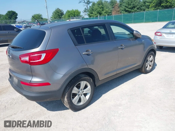2012 Kia Sportage LX with VIN KNDPBCA28C7237079, listed as a IAAI auction lot 42663554 with 245,420 mi miles and . Bid and sale history available at DreamBid. Image 4.