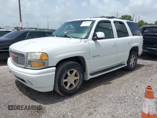 2002 GMC Yukon Denali z VIN 1GKEK63UX2J216442, wystawiony jako IAAI lot #42391575 z przebiegiem 122 668 mil mil oraz . Historia ofert i sprzedaży dostępna na DreamBid. Obrazek 2.