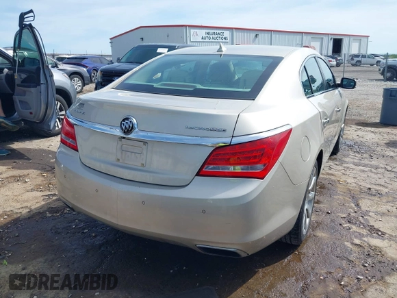 2014 Buick LaCrosse Premium I with VIN 1G4GD5G37EF197099, listed as a IAAI auction lot 42000201 with 199,212 mi miles and . Bid and sale history available at DreamBid. Image 4.