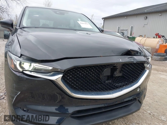 2018 Mazda CX-5 Grand Touring with VIN JM3KFBDM3J0384431, listed as a IAAI auction lot 42013474 with 65,018 mi miles. Bid and sale history available at carsss.com. Image 6.