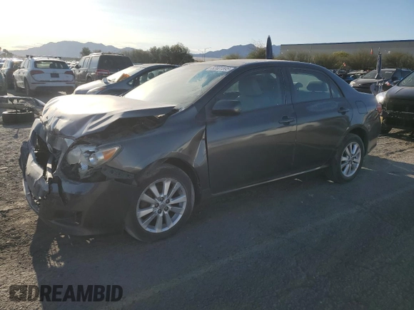 2010 Toyota Corolla with VIN 2T1BU4EE1AC363990, listed as a Copart auction lot 52001595 with 244,000 mi miles and Salvage title. Bid and sale history available at DreamBid. Image 1.