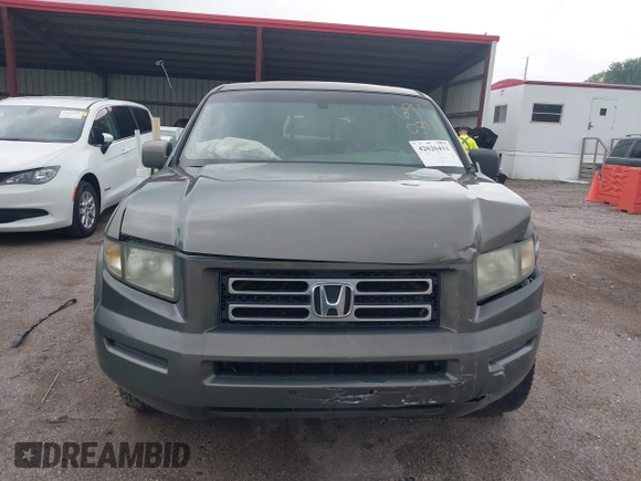 2007 Honda Ridgeline RTL with VIN 2HJYK16517H513832, listed as a IAAI auction lot 42626411 with 209,171 mi miles and . Bid and sale history available at DreamBid. Image 12.