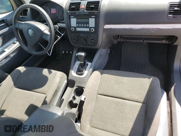 2009 Volkswagen Rabbit S с VIN WVWBA71K29W048964, выставлен на аукционе Copart как лот 71843944 с пробегом 139 118 миль миль и Списание • Salvage title. История ставок и продаж доступна на DreamBid. Изображение 8.