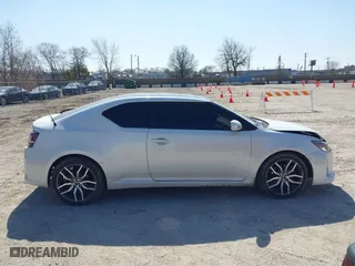 2016 Scion tC with VIN JTKJF5C70GJ019590, listed as a IAAI auction lot 41798426 with 69,045 mi miles. Bid and sale history available at carsss.com. Image 13.