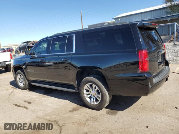 2019 Chevrolet Suburban LS with VIN 1GNSCGKC6KR180042, listed as a Copart auction lot 76829394 with 75,574 mi miles and Salvage title. Bid and sale history available at DreamBid. Image 2.