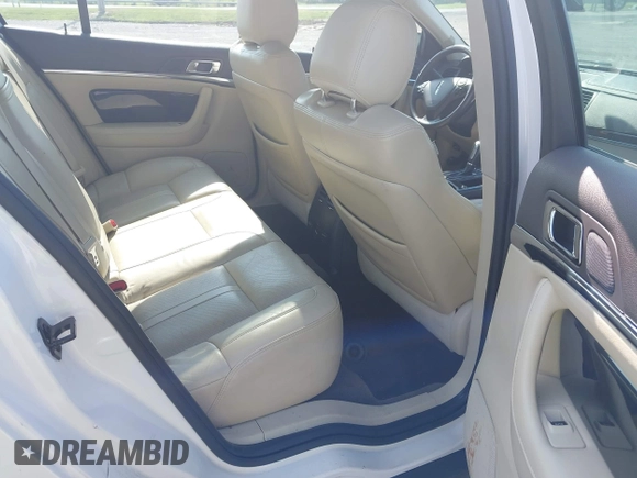 2013 Lincoln MKS EcoBoost with VIN 1LNHL9FT4DG614140, listed as a IAAI auction lot 42866991 with 126,487 mi miles and . Bid and sale history available at DreamBid. Image 8.