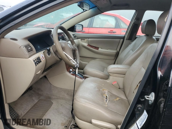 2005 Toyota Corolla CE with VIN 1NXBR30E75Z463700, listed as a Copart auction lot 84317814 with 210,910 mi miles and Clean Title. Bid and sale history available at DreamBid. Image 7.