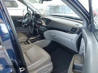 2019 Honda Pilot Touring 8-Passenger z VIN 5FNYF5H97KB013530, wystawiony jako IAAI lot #42403449 z przebiegiem 90 557 mil mil oraz . Historia ofert i sprzedaży dostępna na DreamBid. Obrazek 5.