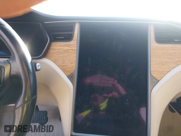 2019 Tesla Model S 75D with VIN 5YJSA1E2XKF331744, listed as a IAAI auction lot 41483173 with Not provided miles and . Bid and sale history available at DreamBid. Image 18.