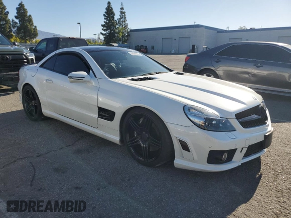 2011 Mercedes-Benz SL with VIN WDBSK7AA2BF161192, listed as a Copart auction lot 56569655 with 47,921 mi miles and Salvage title. Bid and sale history available at DreamBid. Image 4.