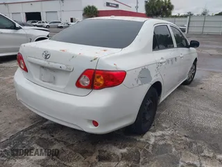 2010 Toyota Corolla with VIN JTDBU4EEXAJ085269, listed as a IAAI auction lot 41989533 with 141,564 mi miles. Bid and sale history available at carsss.com. Image 4.