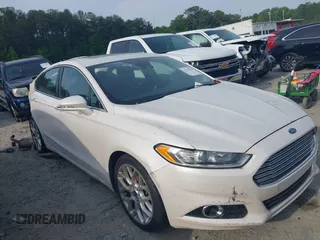 2014 Ford Fusion Titanium with VIN 3FA6P0K94ER102349, listed as a IAAI auction lot 42119710 with 266,438 mi miles and . Bid and sale history available at DreamBid. Image 1.
