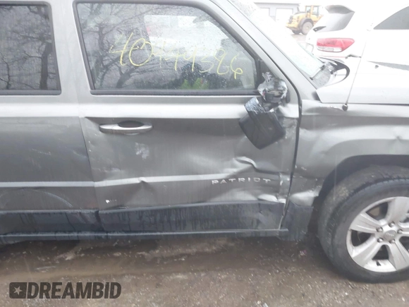 2013 Jeep Patriot Latitude with VIN 1C4NJPFB8DD129848, listed as a IAAI auction lot 40949386 with 168,839 mi miles and . Bid and sale history available at carsss.com. Image 6.