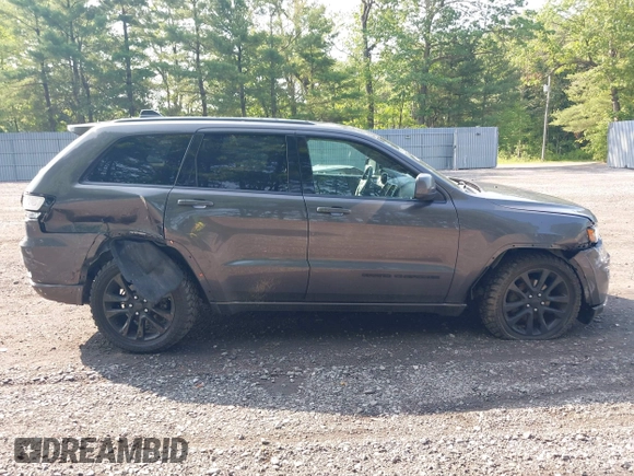 2017 Jeep Grand Cherokee Altitude with VIN 1C4RJFAG4HC807439, listed as a IAAI auction lot 42468652 with 149,807 mi miles and . Bid and sale history available at DreamBid. Image 13.