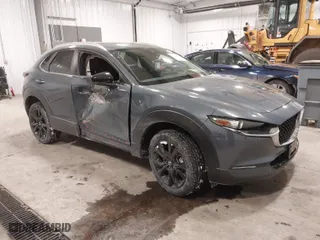 2023 Mazda CX-30 2.5 S Preferred Package with VIN 3MVDMBCM6PM514585, listed as a IAAI auction lot 41556555 with 15,626 mi miles. Bid and sale history available at carsss.com. Image 1.