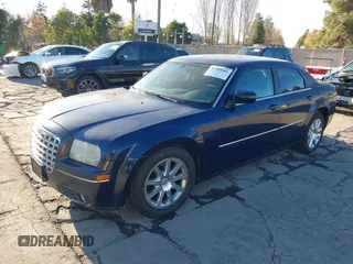 2006 Chrysler 300 Touring with VIN 2C3KA53G46H434572, listed as a IAAI auction lot 41309681 with 245,001 mi miles. Bid and sale history available at carsss.com. Image 2.