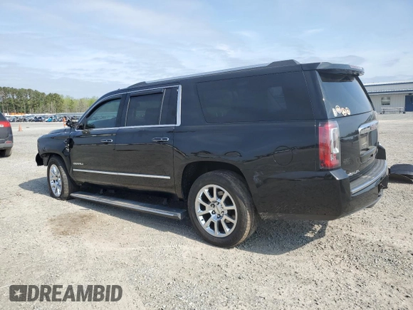 2015 GMC Yukon XL Denali with VIN 1GKS2JKJ5FR243343, listed as a Copart auction lot 51352125 with 142,996 mi miles and Salvage Title. Bid and sale history available at DreamBid. Image 2.
