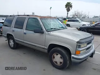 1999 Chevrolet Tahoe Z71 with VIN 1GNEK13R4XJ504675, listed as a IAAI auction lot 42162102 with 320,128 mi miles and . Bid and sale history available at DreamBid. Image 1.