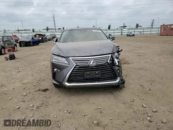 2016 Lexus RX 350 with VIN 2T2BZMCAXGC030046, listed as a Copart auction lot 56946845 with 64,529 mi miles and Salvage title. Bid and sale history available at DreamBid. Image 13.