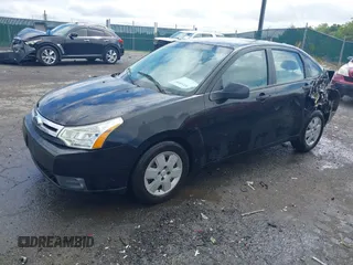 2009 Ford Focus S z VIN 1FAHP34N09W220485, wystawiony jako IAAI lot #42249397 z przebiegiem 68 869 mil mil oraz . Historia ofert i sprzedaży dostępna na DreamBid. Obrazek 2.