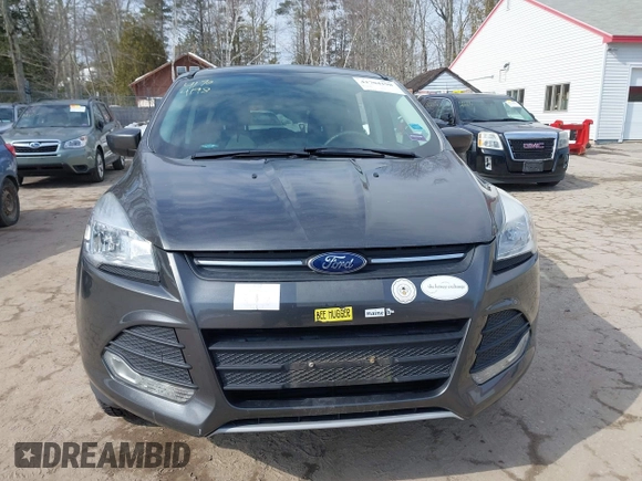 2015 Ford Escape SE with VIN 1FMCU0GXXFUB99852, listed as a IAAI auction lot 41704198 with 84,735 mi miles. Bid and sale history available at carsss.com. Image 15.
