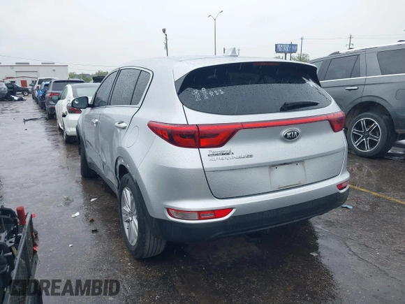 2018 Kia Sportage LX with VIN KNDPM3AC7J7337951, listed as a IAAI auction lot 41900482 with 105,857 mi miles and . Bid and sale history available at carsss.com. Image 3.