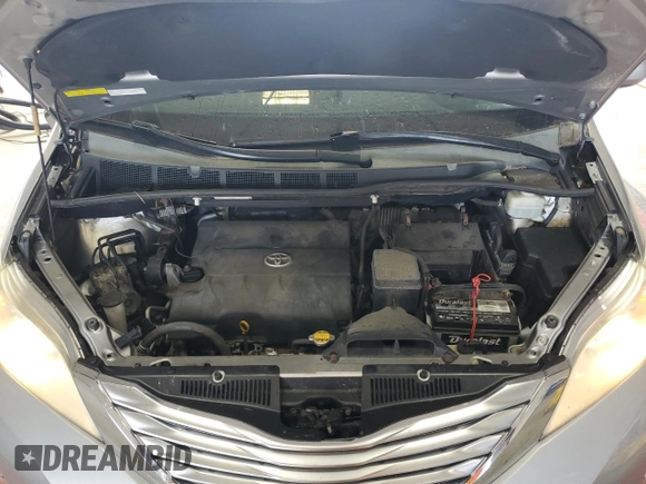 2011 Toyota Sienna XLE with VIN 5TDDK3DC7BS022837, listed as a Copart auction lot 60811445 with 210,732 mi miles and Salvage title. Bid and sale history available at DreamBid. Image 12.