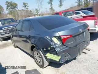 2019 Toyota Corolla L with VIN 2T1BURHE4KC134729, listed as a IAAI auction lot 41779629 with 240,685 mi miles. Bid and sale history available at carsss.com. Image 3.