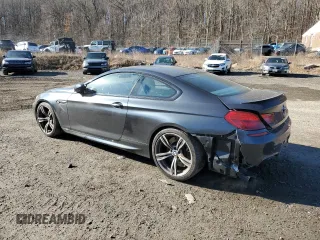 2015 BMW M6 with VIN WBSLX9C58FD160643, listed as a Copart auction lot 49293955 with 87,568 mi miles and Salvage Title. Bid and sale history available at carsss.com. Image 2.