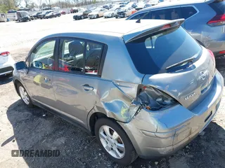 2012 Nissan Versa S with VIN 3N1BC1CP0CK206613, listed as a IAAI auction lot 41836647 with 180,698 mi miles. Bid and sale history available at carsss.com. Image 6.
