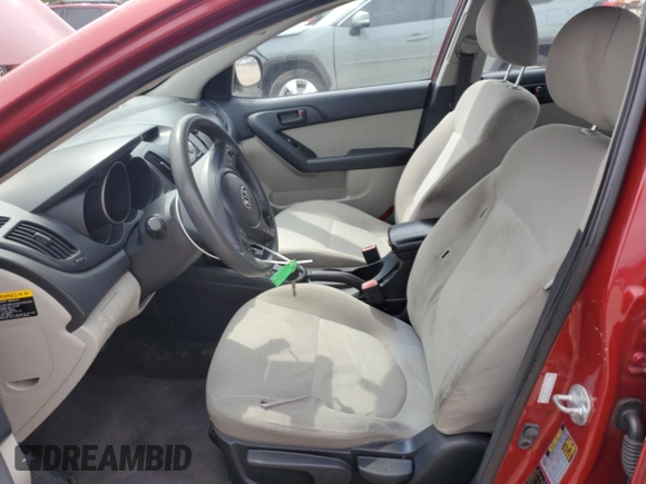 2010 Kia Forte EX z VIN KNAFU4A21A5063115, wystawiony jako Copart lot #54522455 z przebiegiem 147 246 mil mil oraz Tytuł czysty. Historia ofert i sprzedaży dostępna na DreamBid. Obrazek 7.