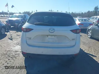 2019 Mazda CX-5 Grand Touring with VIN JM3KFBDM2K0672720, listed as a IAAI auction lot 41751196 with 51,632 mi miles and . Bid and sale history available at carsss.com. Image 16.