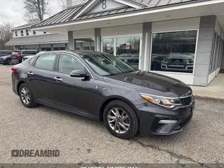 2019 Kia Optima LX with VIN 5XXGT4L3XKG307311, listed as a IAAI auction lot 42033854 with 257,227 mi miles. Bid and sale history available at carsss.com. Image 1.