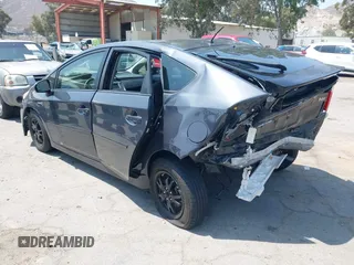 2015 Toyota Prius Four with VIN JTDKN3DU9F0473025, listed as a IAAI auction lot 42425733 with 124,196 mi miles and . Bid and sale history available at DreamBid. Image 3.