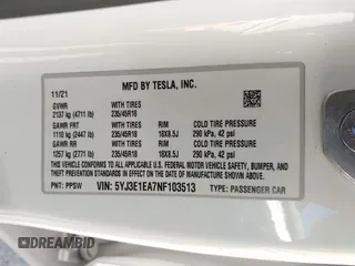 2022 Tesla Model 3 with VIN 5YJ3E1EA7NF103513, listed as a IAAI auction lot 41643592 with 35,631 mi miles and . Bid and sale history available at DreamBid. Image 9.
