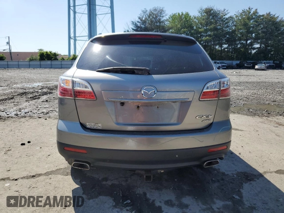 2010 Mazda CX-9 Grand Touring с VIN JM3TB3MV7A0221845, выставлен на аукционе Copart как лот 60701045 с пробегом 226 889 миль миль и Списание • Salvage title. История ставок и продаж доступна на DreamBid. Изображение 6.