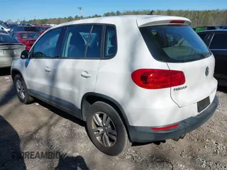 2012 Volkswagen Tiguan SE with VIN WVGAV7AX9CW590965, listed as a IAAI auction lot 41852407 with 153,953 mi miles and . Bid and sale history available at DreamBid. Image 3.