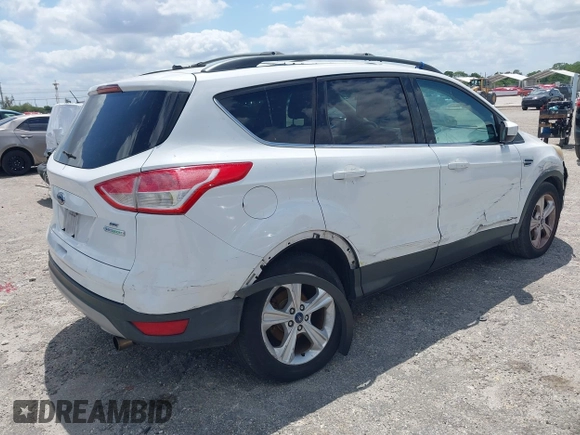 2013 Ford Escape SE with VIN 1FMCU0GX0DUC79223, listed as a IAAI auction lot 42077240 with 158,141 mi miles and . Bid and sale history available at DreamBid. Image 4.