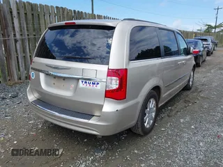 2014 Chrysler Town & Country Touring with VIN 2C4RC1BG2ER413257, listed as a IAAI auction lot 42181370 with 163,374 mi miles and . Bid and sale history available at DreamBid. Image 4.