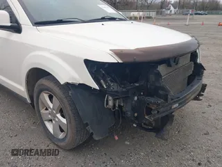 2012 Dodge Journey SXT with VIN 3C4PDCCG6CT132457, listed as a IAAI auction lot 41907657 with 169,160 mi miles and . Bid and sale history available at DreamBid. Image 13.