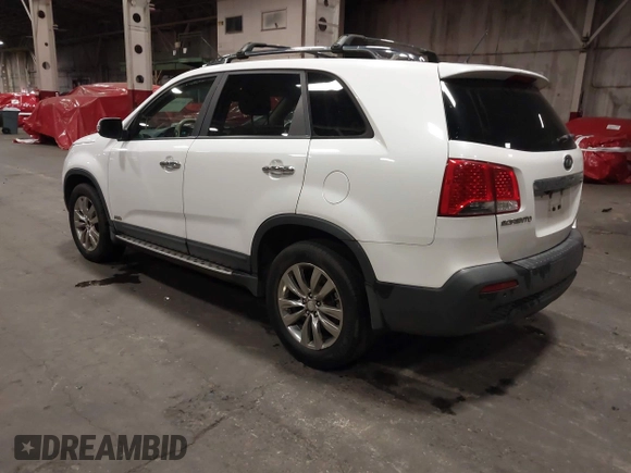 2011 Kia Sorento EX with VIN 5XYKUDA2XBG136475, listed as a IAAI auction lot 41795452 with 218,041 mi miles. Bid and sale history available at carsss.com. Image 3.