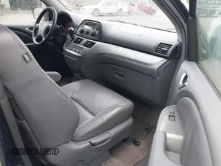 2005 Honda Odyssey EX-L with VIN 5FNRL38725B001662, listed as a IAAI auction lot 42693301 with 161,114 mi miles and . Bid and sale history available at DreamBid. Image 5.