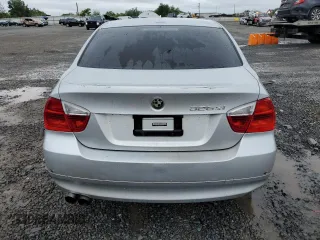 2006 BMW 3 Series 325xi with VIN WBAVD135X6KV00720, listed as a Copart auction lot 58437145 with 148,343 mi miles and Salvage title. Bid and sale history available at DreamBid. Image 6.