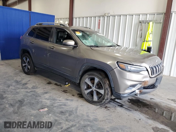 2019 Jeep Cherokee Limited with VIN 1C4PJMDX2KD335007, listed as a Copart auction lot 61443885 with 128,805 mi miles and Clean title. Bid and sale history available at DreamBid. Image 4.