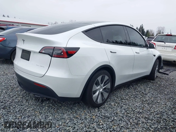 2023 Tesla Model Y Long Range with VIN 7SAYGDEE7PF809164, listed as a IAAI auction lot 41828974 with 31,772 mi miles. Bid and sale history available at carsss.com. Image 4.