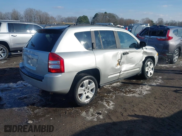 2008 Jeep Compass Sport with VIN 1J8FT47098D665734, listed as a IAAI auction lot 41561801 with 169,446 mi miles. Bid and sale history available at carsss.com. Image 4.