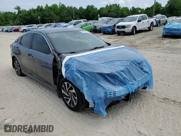 2017 Honda Civic EX z VIN 19XFC2F71HE017068, wystawiony jako Copart lot #53541655 z przebiegiem 148 087 mil mil oraz Szkoda całkowita • Salvage title. Historia ofert i sprzedaży dostępna na DreamBid. Obrazek 14.